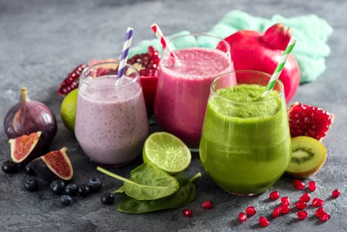 Colorful fruit smoothies and fruit