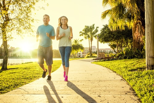 Couple walking in a morning sunrise