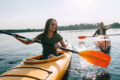 Couple kayaking in a lake