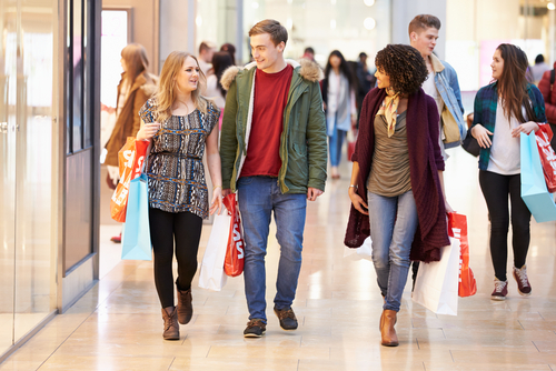Group of friends walking in a shopping mall