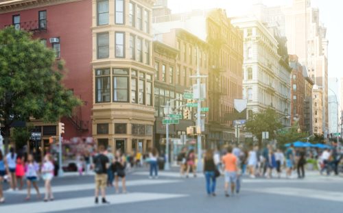 Crowd of people walking in an urban environment