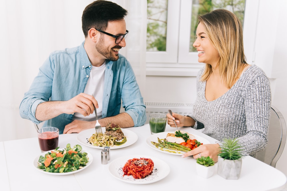 Couple eating healthy a healthy home meal