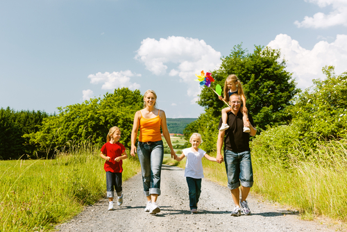 Family walking together in the countryside