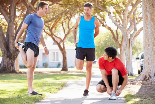 Men stretching getting ready for a walk or run