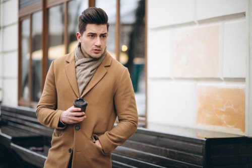 Man getting a coffee on the way to work