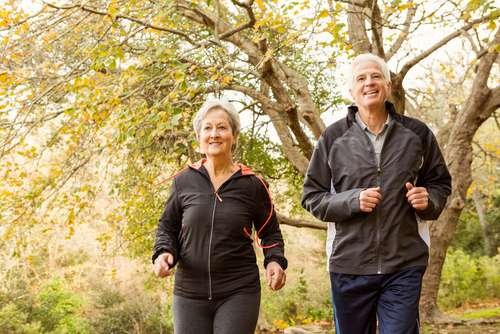 Older couple walking for fitness