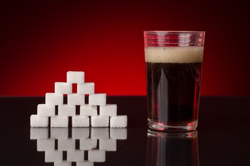 Soda with sugar cubes unhealthy soda concept