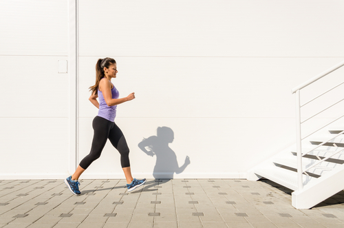Sporty woman walking for fitness