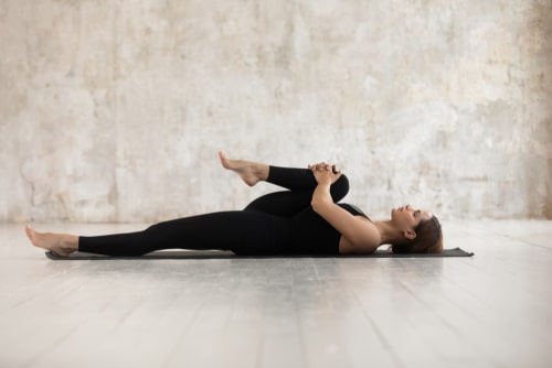 Pilates single leg stretch concept