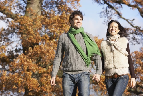 Couple walking in the park for fitness