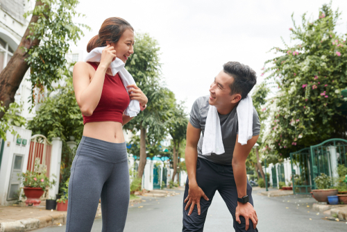 Couple sweating after a fitness walk or run