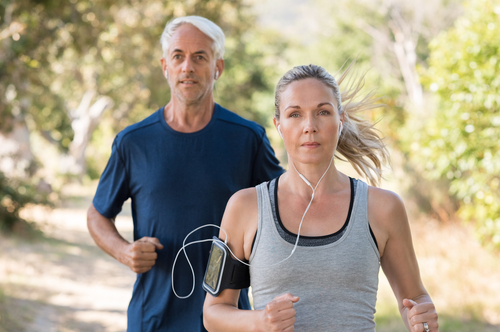 Couple on a long walk for fitness or cardio