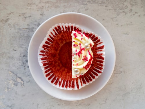 Half a red velvet cupcake - split dessert concept