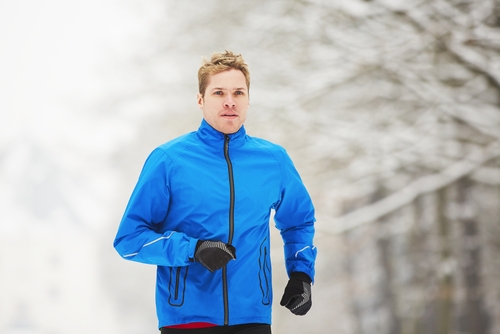Man walking outside in winter clothes