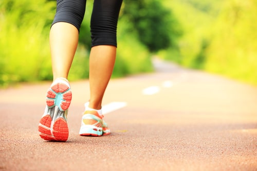 Close up of walking shoes on a walking path