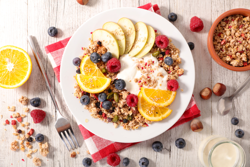 Healthy, colorful breakfast yogurt bowl and fruit