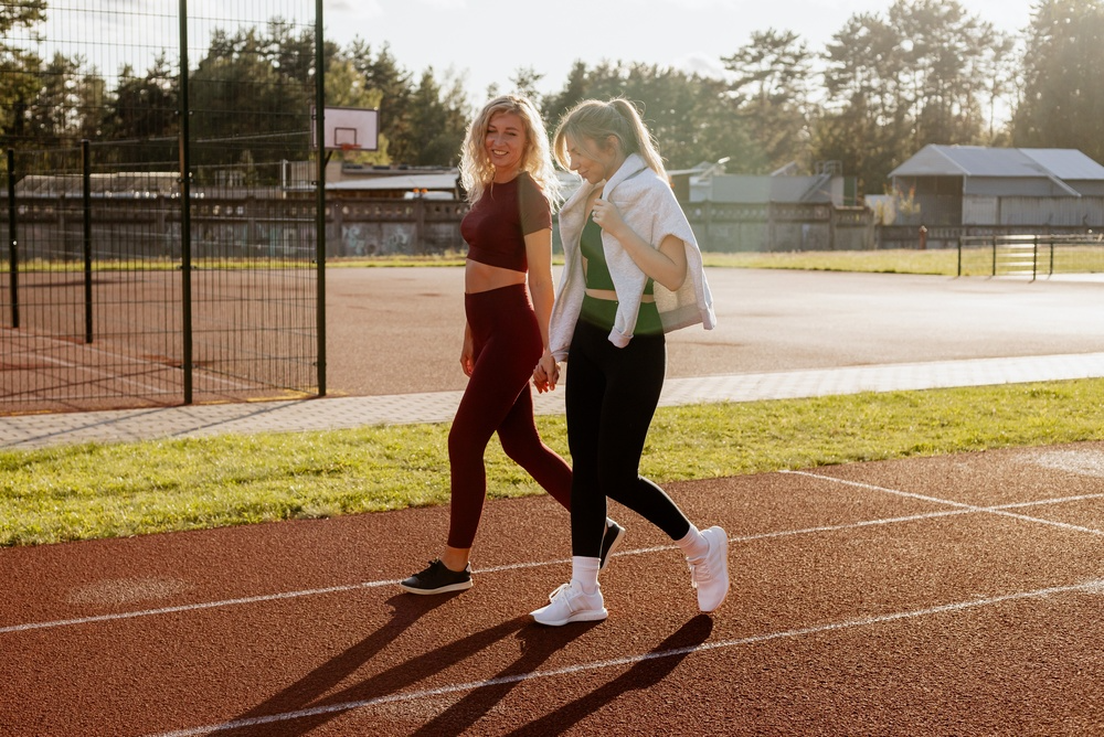 Coworkers being active together at the office during a workplace step challenge