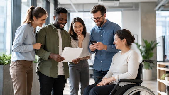 Coworkers reviewing the rules for a workplace step challenge together