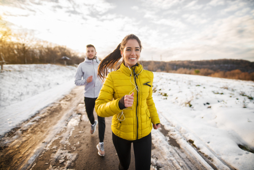 Couple doing an intense walk in winter