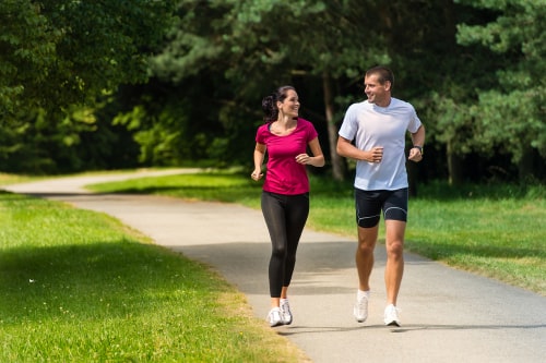 couple doing jogging or brisk walking, demonstrating high average walking speed