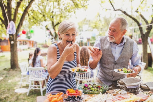 Senior couple eating sparingly at Thanksgiving