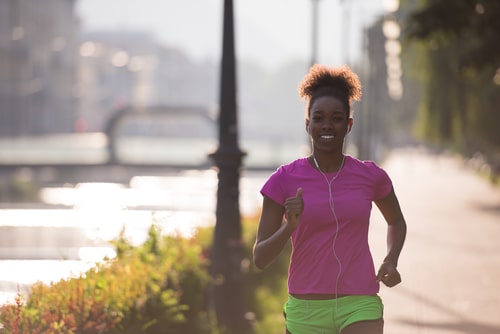 Woman walking for fitness in the morning