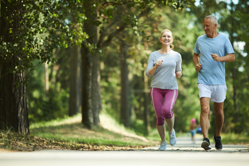 Senior couple jogging in the park