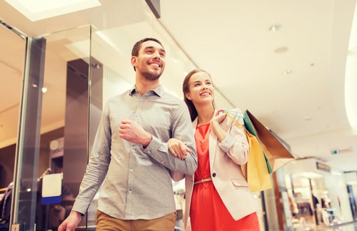 Couple walking together in a mall