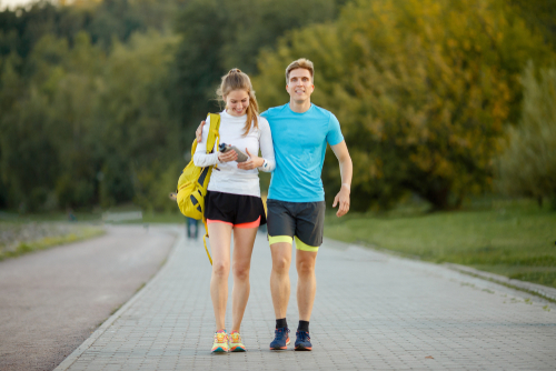Happy couple walking in the park