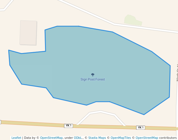 walking in Sign Post Forest map in Watson Lake